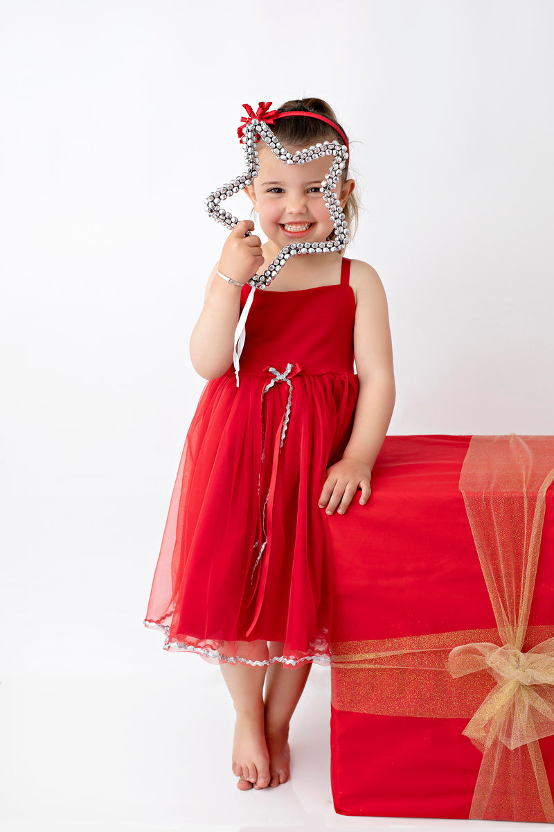 “Exclusive Blueberry little girls' party dress by Vanessa Lynne, made with high-quality printed cotton, featuring piping, ribbon accents, and a cute bow at the center. Fully lined for extra puff, perfect for twirling at any occasion.”